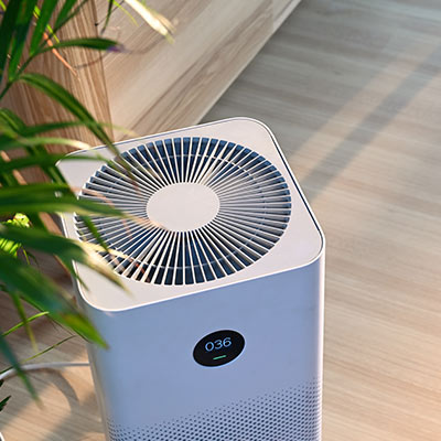 A home air purifier, which is one of the indoor air quality and ventilation services we offer at Comfort Zone